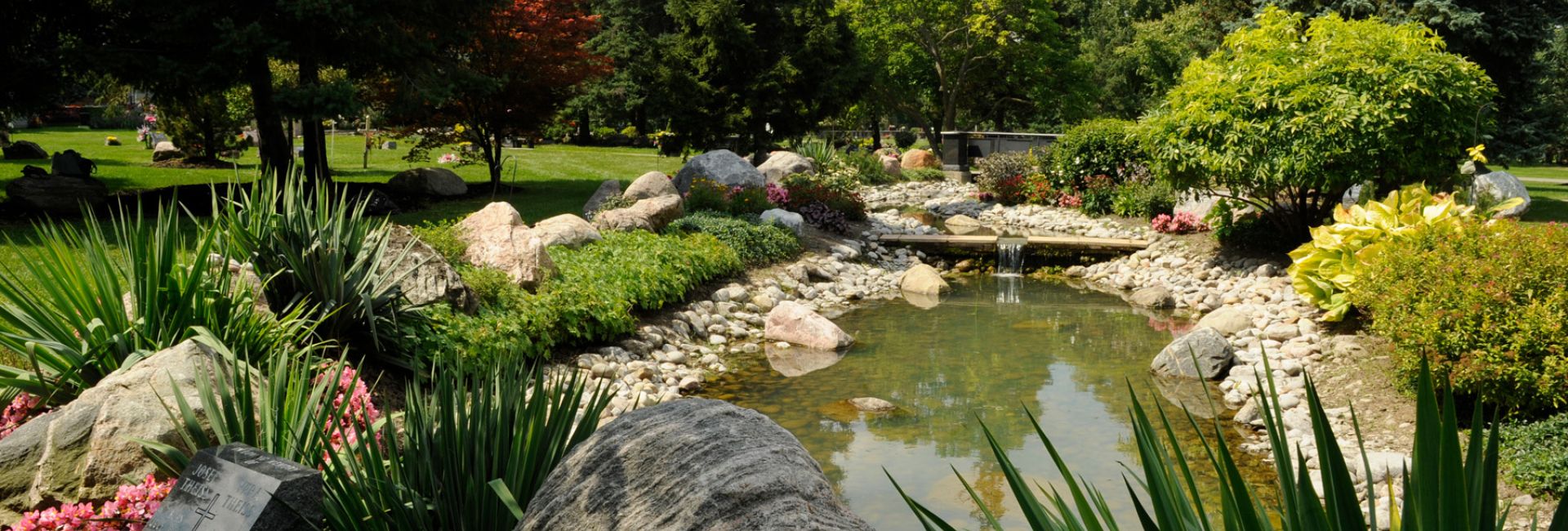 Peaceful view of York Cemetery and Funeral Centre, highlighting its tranquil grounds, mature trees, and historic memorials. Peaceful view of York Cemetery