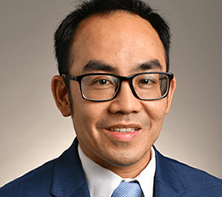 asian man with glasses