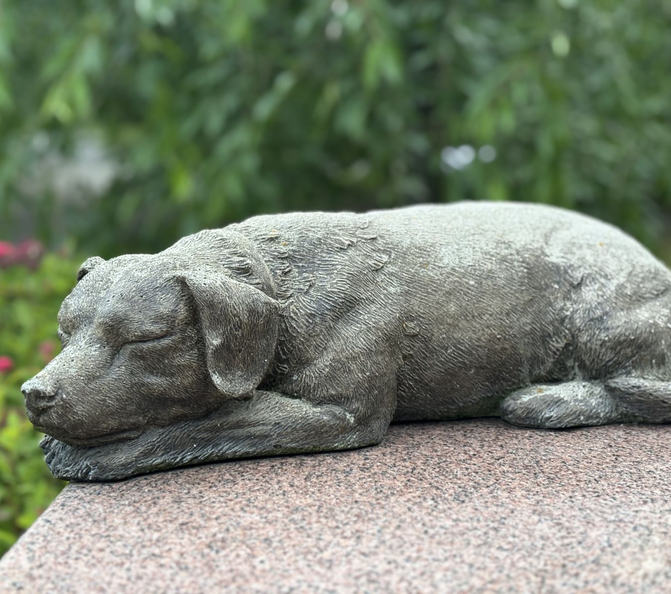 dog monument on top of a grave dog monument on top of a grave