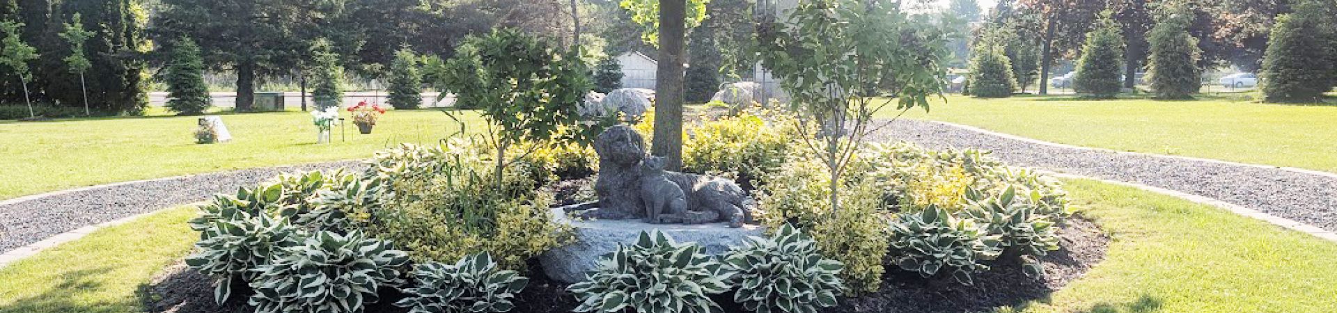 pet memorial surrounded by trees